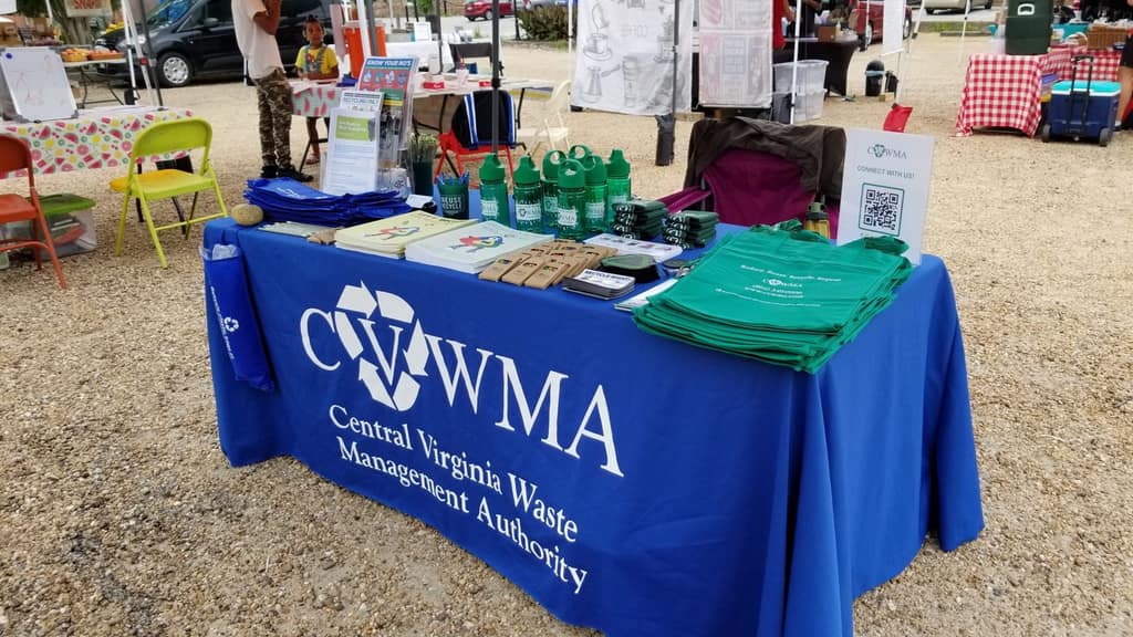 A CVWMA outreach table at a community market